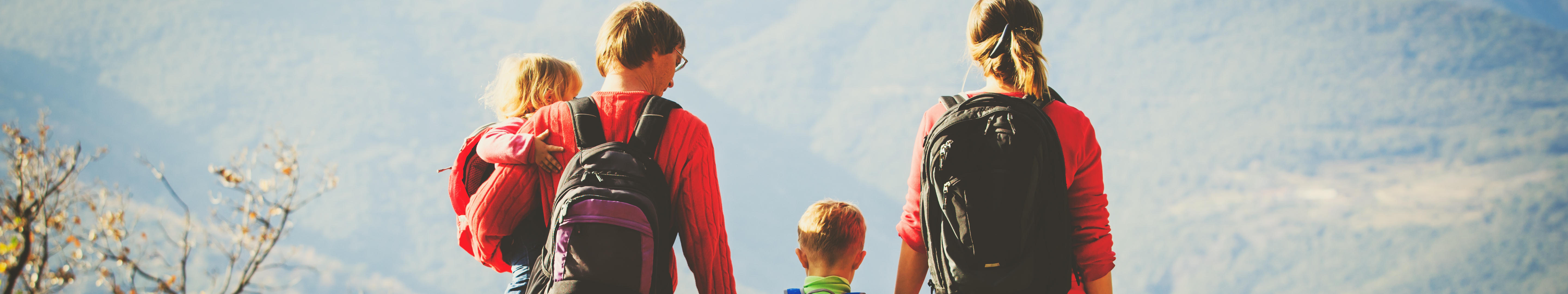 family hiking in the mountains