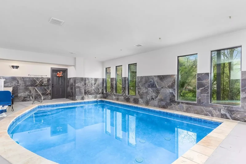 bear mountain lodge pool is one of our large Smoky Mountain cabins with indoor pools